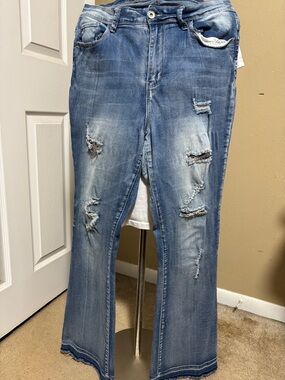 Women’s Distressed Light Blue Flare Jeans
